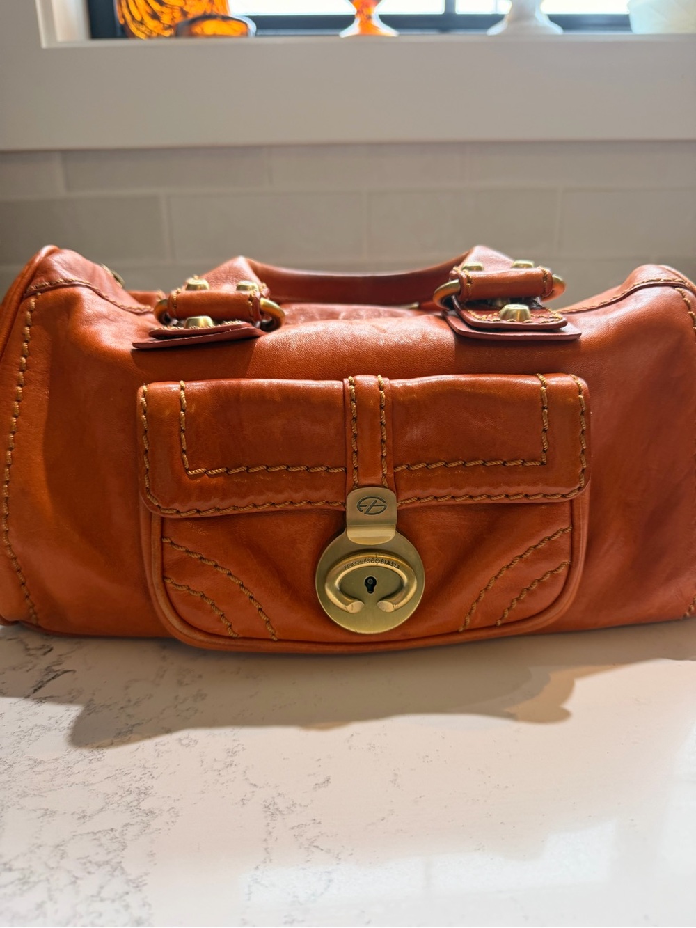 Dooney & Bourke Orange Leather Shoulder Bag with Front Lock